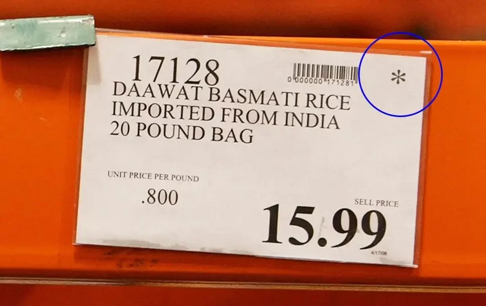 costco price tag with an asterisk